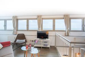 Imagen de la galería de Turm-Appartement Strandburg, en Fehmarn