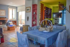 Postel nebo postele na pokoji v ubytování Alekos Beach Houses-Sundance Beach Resort