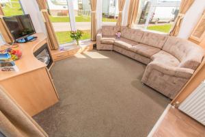 an overhead view of a living room in a bus at Ladram Bay Holiday Park in Otterton