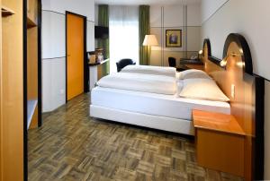 Voodi või voodid majutusasutuse Hotel Fuchspalast toas