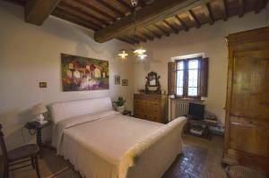 Un pat sau paturi într-o cameră la Villa Scianellone