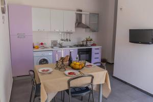 Kuchyň nebo kuchyňský kout v ubytování MareinSicilia: Appartamenti Larica