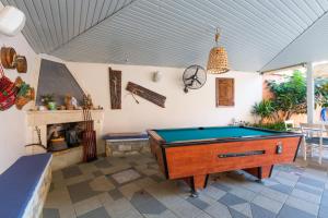 a pool table in the middle of a room at Ormos Atalia in Balíon
