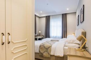 Postel nebo postele na pokoji v ubytování Hotel Khokhobi Old Tbilisi