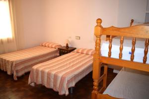 Postel nebo postele na pokoji v ubytování Villa Salitre + 26 fotografií