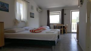 Postel nebo postele na pokoji v ubytování Apartment Viktor