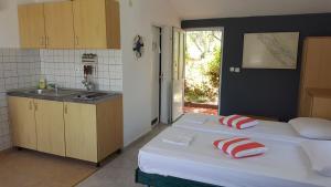 Postel nebo postele na pokoji v ubytování Apartment Viktor