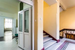 A bed or beds in a room at BpR Turquoise Simplicity Apartment