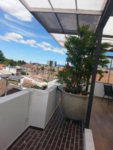 Balkón nebo terasa v ubytování A Bogota On Holidays by Open - HOTEL CAS-EMBAJADA AMERICANA
