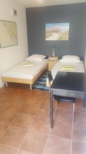 Postel nebo postele na pokoji v ubytování Apartment Viktor