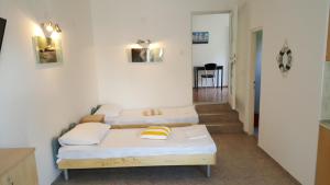 Postel nebo postele na pokoji v ubytování Apartment Viktor