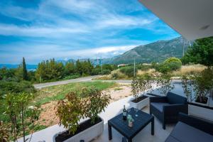 a view from the balcony of a house with plants at Villa Niki 2 in Cavtat