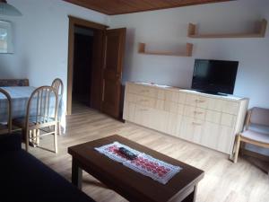 TV a/nebo společenská místnost v ubytování Residence Haus Peder