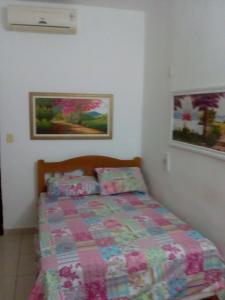 Un pat sau paturi într-o cameră la Hostel Mota
