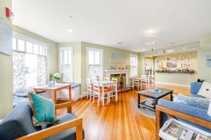 a living room with a couch and a table at HI Hyannis Hostel in Hyannis