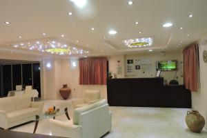 Posezení v ubytování Golden Rose Suites