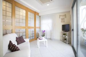 TV a/nebo společenská místnost v ubytování Hotel Savana