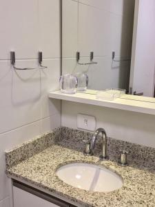 Ένα μπάνιο στο Estudio moderno com linda vista para a Serra