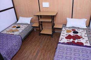 Postel nebo postele na pokoji v ubytování Jungleparadiso Hostel