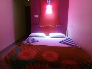 Postel nebo postele na pokoji v ubytování Jungleparadiso Hostel