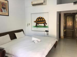 Postel nebo postele na pokoji v ubytování Pushkar Vela Resort