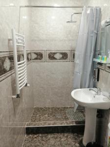Koupelna v ubytování Hotel IVERIA