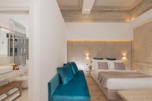 A bed or beds in a room at Navona Style