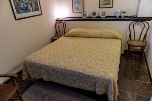 A bed or beds in a room at Holiday villa Gelso - Ragusa