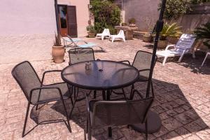 A patio or other outdoor area at Holiday villa Gelso - Ragusa