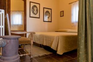 A bed or beds in a room at Holiday villa Gelso - Ragusa