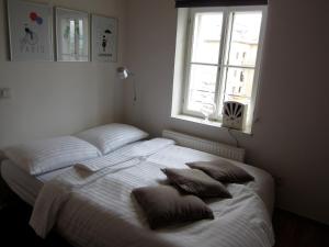 Postel nebo postele na pokoji v ubytování City-Center Apartments
