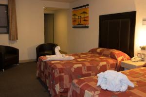 Postel nebo postele na pokoji v ubytování Hotel Posada Guadalupe