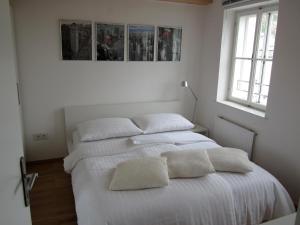 Postel nebo postele na pokoji v ubytování City-Center Apartments