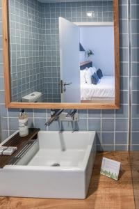 Een badkamer bij Furnas Lake Forest Living