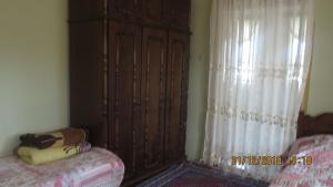 Postel nebo postele na pokoji v ubytování Guest House Gio