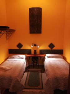 Кровать или кровати в номере Casa Degli Amici