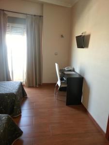 TV a/nebo společenská místnost v ubytování Hotel Almoradi