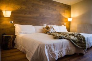 Postel nebo postele na pokoji v ubytování Hotel Miramonti Family & SPA