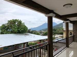 a balcony with a view of a mountain at Casa Imelda, Atitlan in Sololá