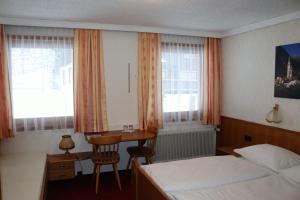Postel nebo postele na pokoji v ubytování Hotel Rupertihaus