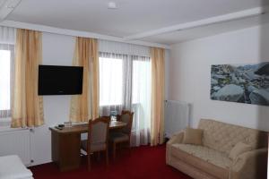 TV a/nebo společenská místnost v ubytování Hotel Rupertihaus