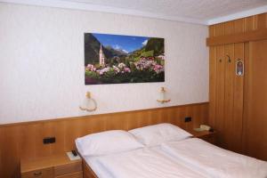 Postel nebo postele na pokoji v ubytování Hotel Rupertihaus