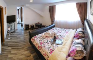 En eller flere senge i et værelse på Pansion Neretva