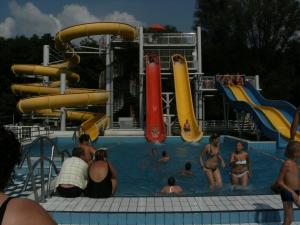 a group of people in a pool at a water park at 98 Petőfi utca in Balatonmagyaród