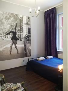 Posteľ alebo postele v izbe v ubytovaní Stylowa Kamienica w Centrum