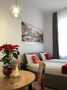 Posteľ alebo postele v izbe v ubytovaní M37 Apartman