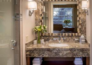 a bathroom with a sink and a mirror at Sun Valley Resort in Sun Valley
