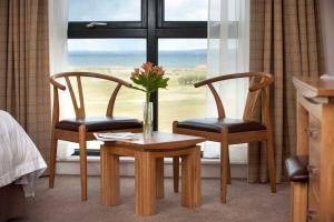 A seating area at The Lodge at Craigielaw and Golf Courses 
