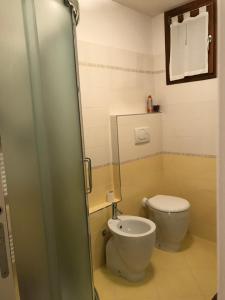 Koupelna v ubytování 1000sogni + 27 fotografií