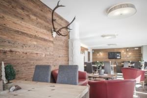 TV a/nebo společenská místnost v ubytování Appartement & Hotel Innerhofer